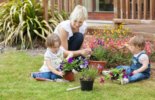 Landscaping team carrying out a safety-checked garden task